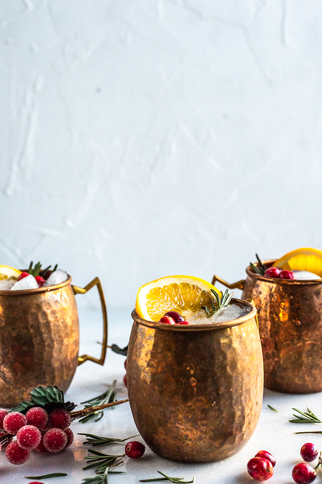 cranberry orange moscow mules in copper mugs