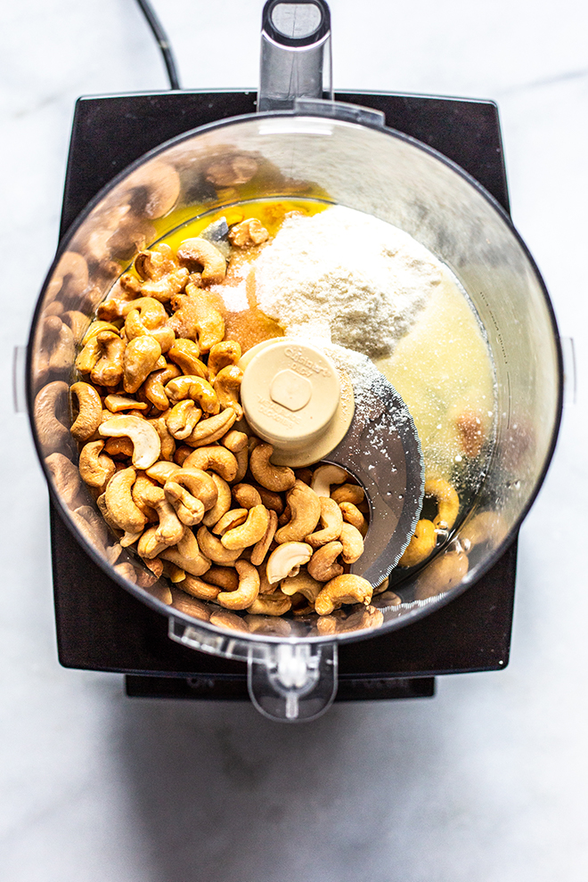 cashews, coconut flour, ghee, and all the making for cashew crust in a food processor. 