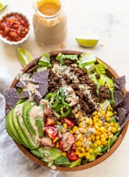 healthy elk taco salad on a white background