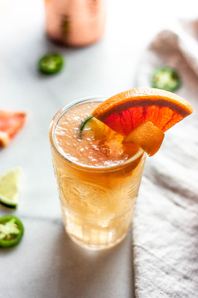 A Spicy Jalapeno Paloma made with fresh grapefruit, jalapenos, agave and of course...tequila. All topped off with grapefruit sparkling water!