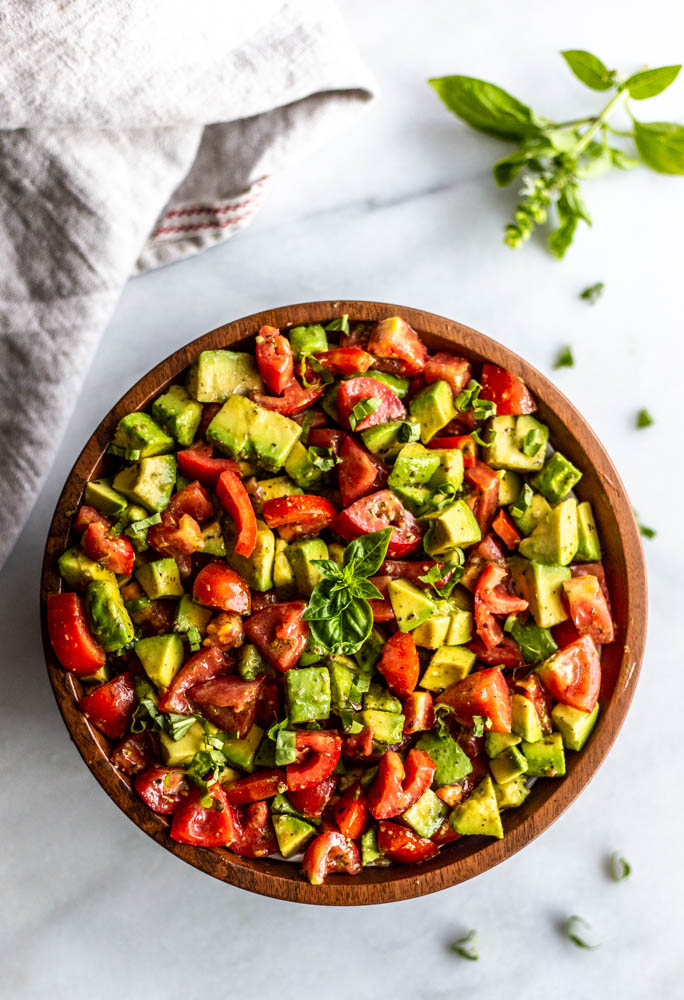 Italian Style Avocado and Tomato Salad is a perfect, healthy side dish for when tomatoes are in season and you need something fast.