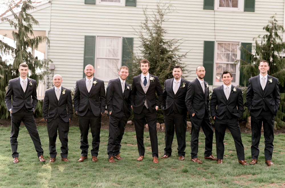 navy and grey groom's suit