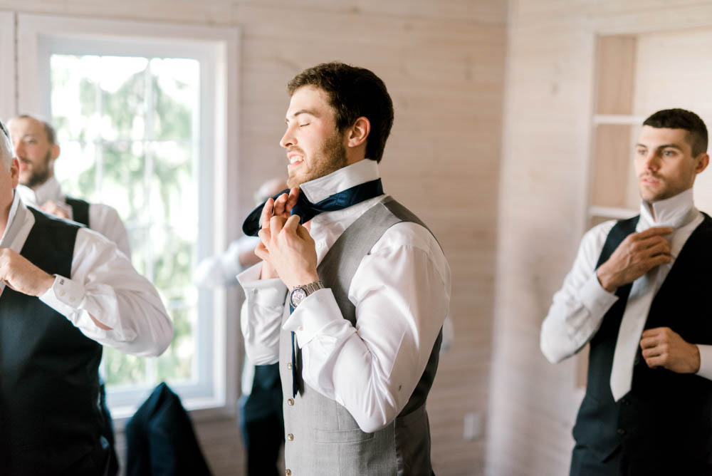 navy and grey groom's suit