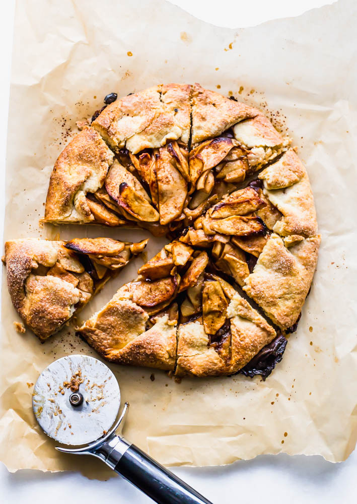 Rustic Apple Galette - If you're afraid of making pie - this Rustic Apple Galette is easier than pie - literally. The perfect apple filling is easily folded into my favorite, buttery pastry crust. Cinnamon and coconut sugar bring out the flavors of the fresh apple in this sweet treat. This is the perfect pastry for a beginner baker. #pastry #apple #applepie #baking #homemade #sweets #dessert 
