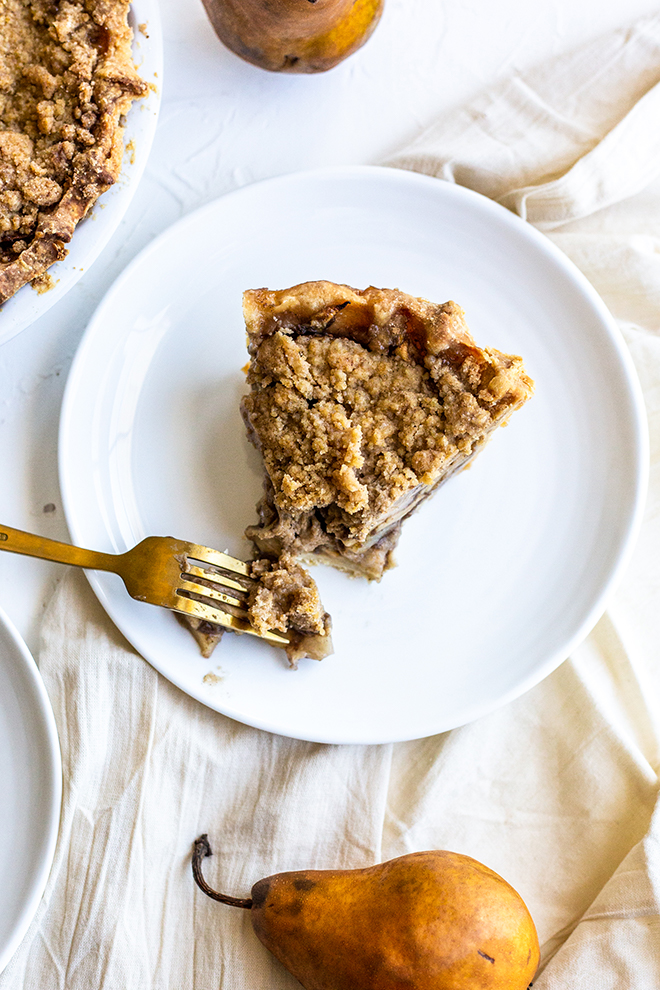 pear apple pie slice with pears on a white background 