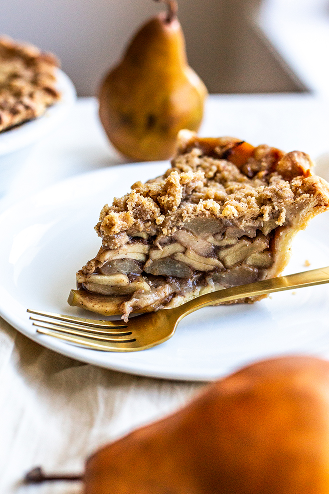 pear apple pie slice with pears on a white background 