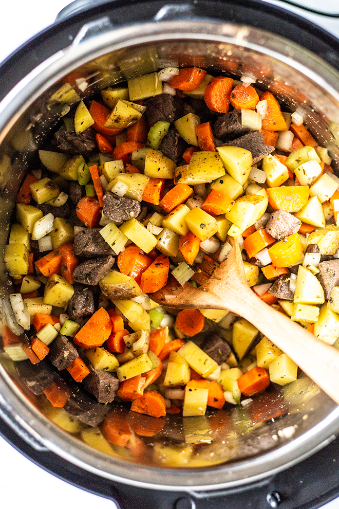 vegetables and venison in an instant pot all diced up