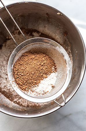 sifted flour and cocoa powder in a metal bowl 