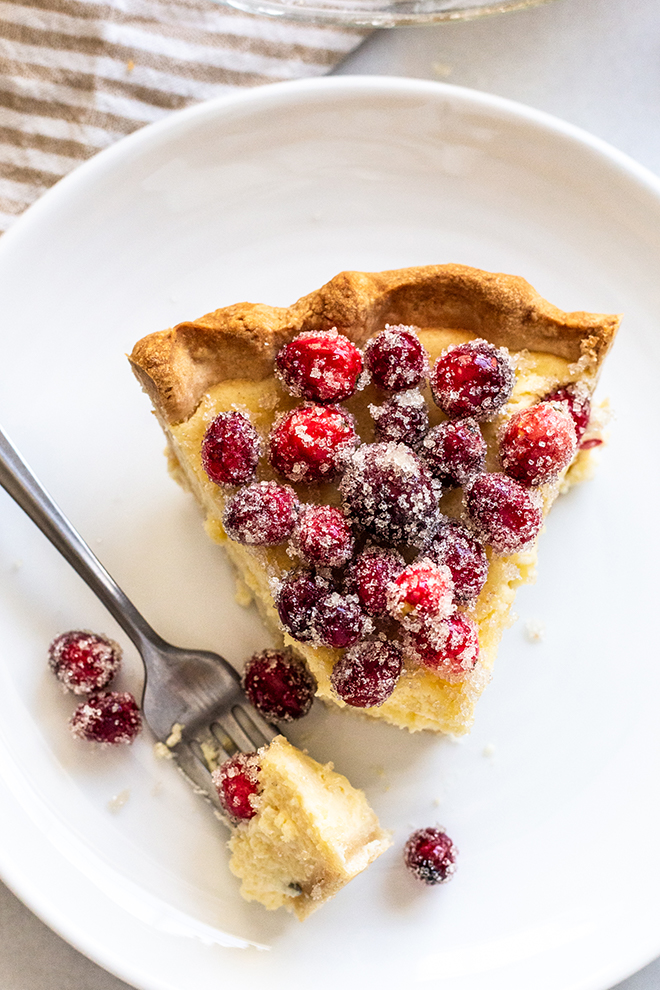 pie slice with a bite out of it on a white plate