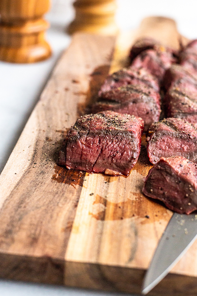 This Smoked Venison Tenderloin is marinated in a fresh, citrus marinade before spending time in the smoker. It's tender, flavorful, smokey and juicy and totally easy to do. 