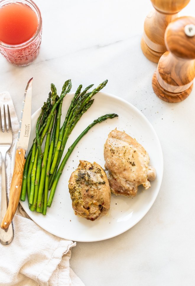 Learn how to make the juiciest chicken thighs right in the Instant Pot. It takes no time at all and you can sear, set it, and forget it. 