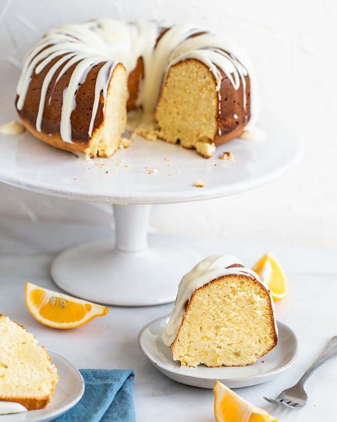 Decadent Meyer lemon flavored pound cake is baked in a bundt pan and covered in a sweet cream cheese glaze. Easy to make and beautiful to serve. 