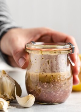 all purpose venison marinade mixed up in a glass jar