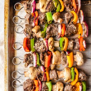 venison kebabs with veggies on skewers