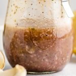 all purpose venison marinade mixed up in a glass jar