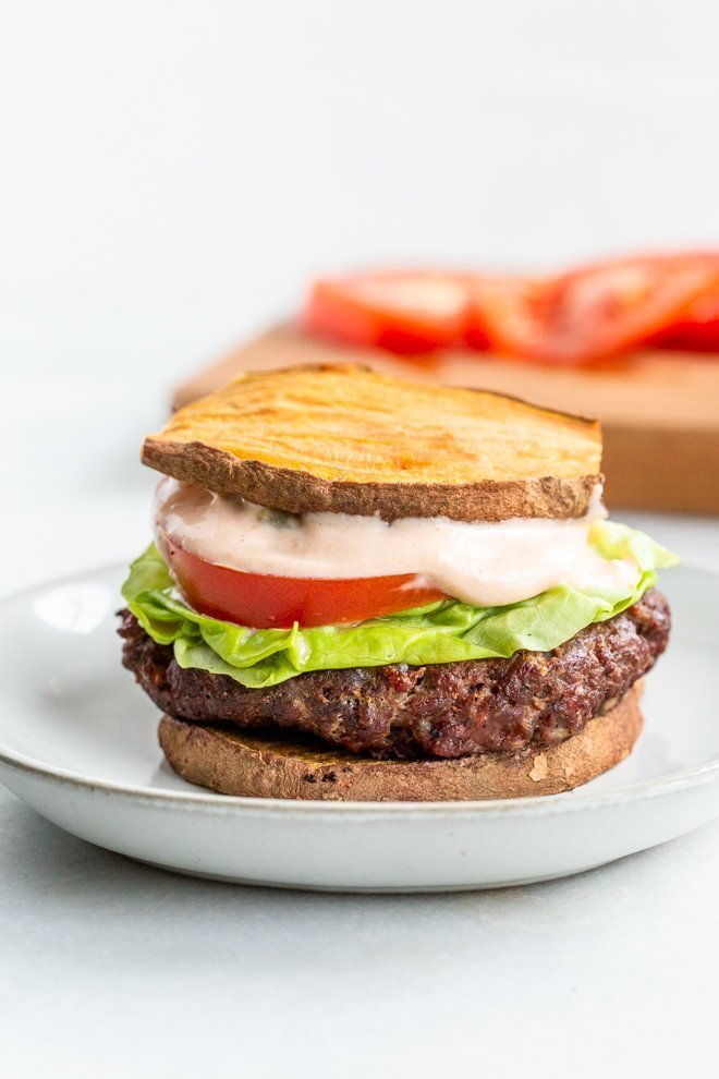 a Burger on a white plate