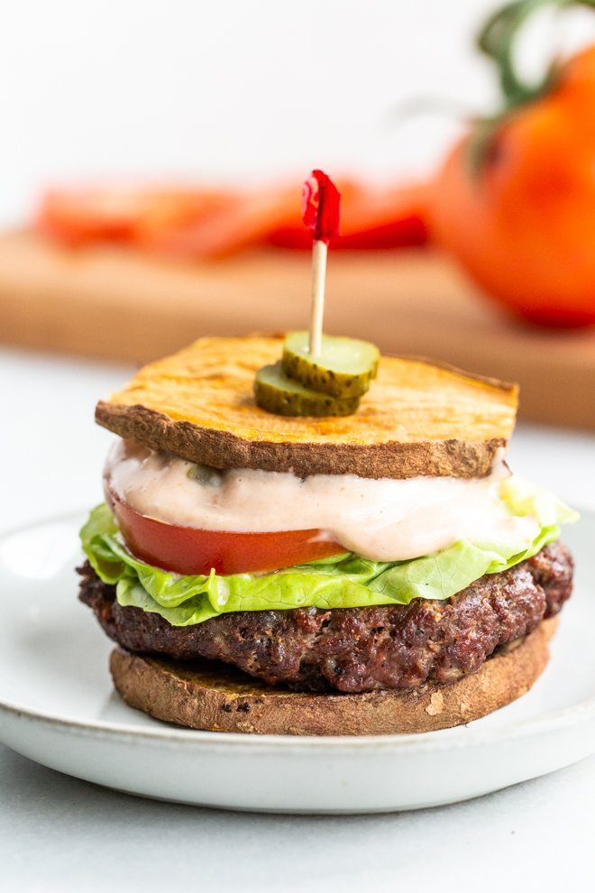 Healthy Whole30 Venison Burgers burger with whole30 special sauce on a white plate