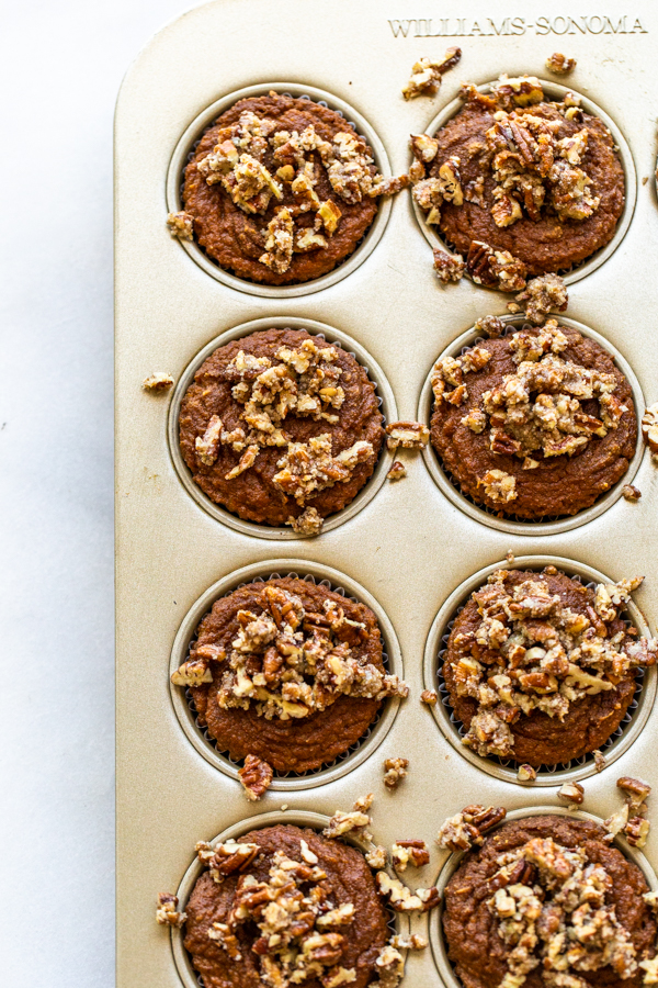 muffins with crumble in a muffin tin that are baked