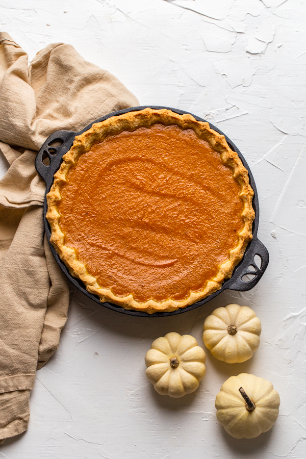 pumpkin pie baked in black, cast iron pie dish