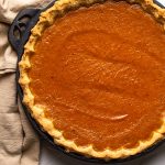 pumpkin pie baked in black, cast iron pie dish