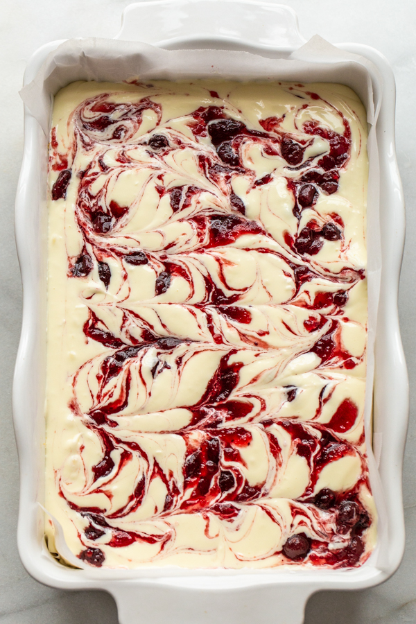 swirled cranberry into unbaked cheesecake bars