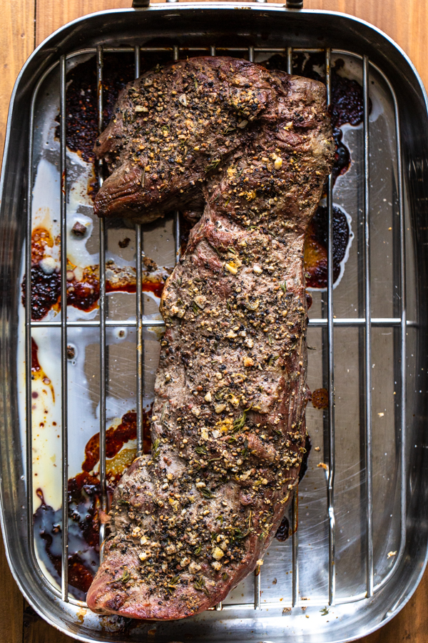 roasted bison tenderloin in a roasting pan