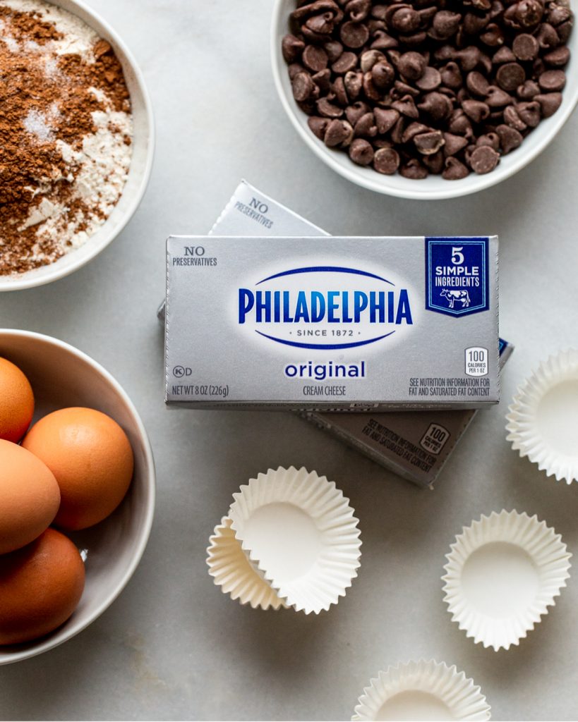 cream cheese and baking supplies on marble