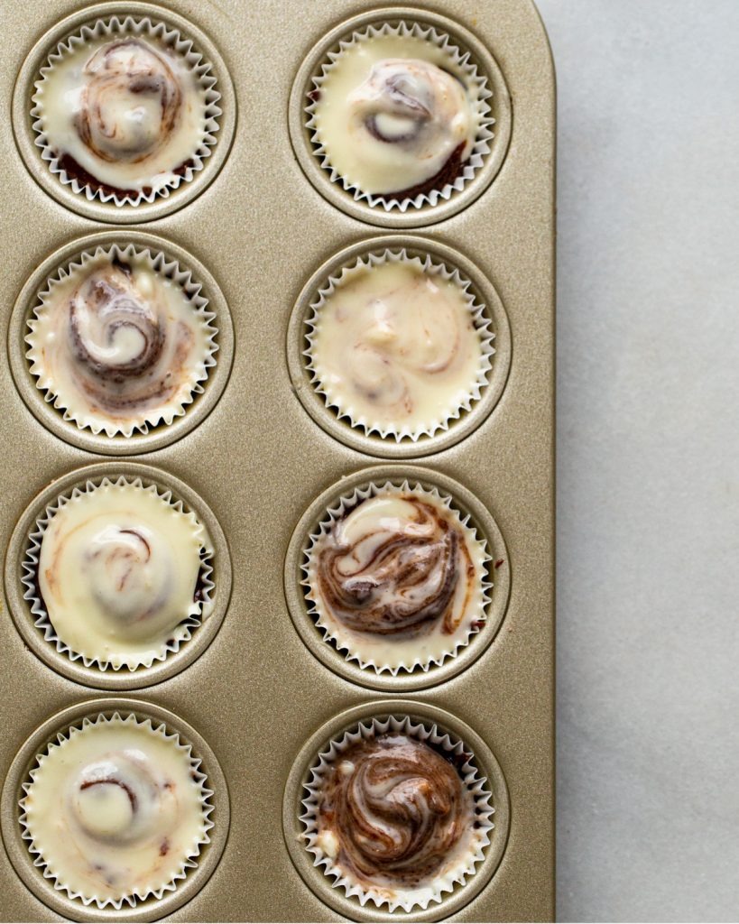 brownie cheesecake bites in mini muffin tins