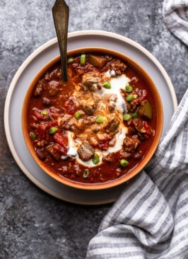 bear chili with a swirl of sour cream in a bowl