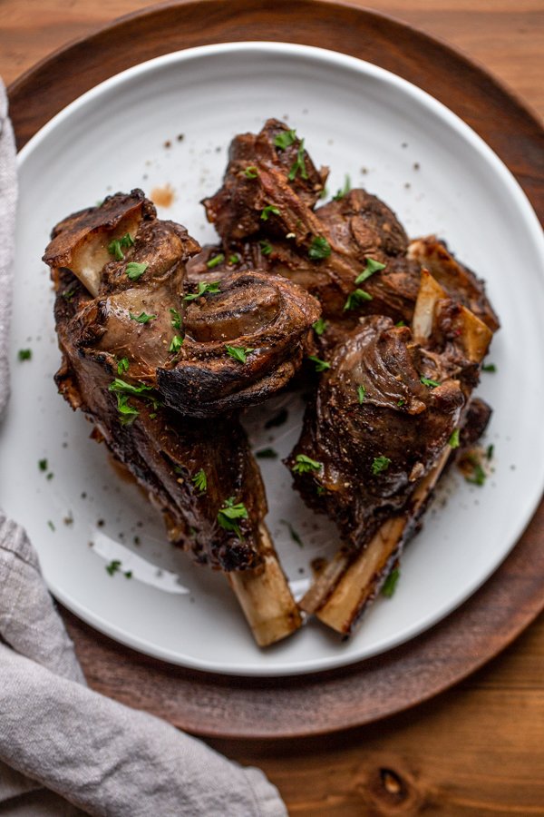 venison shanks on a white place