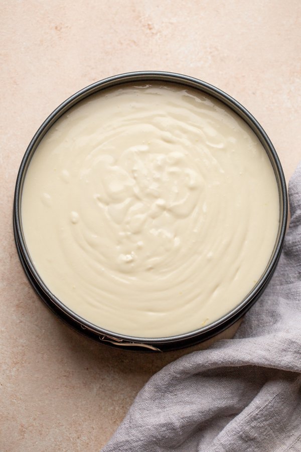cheesecake batter in a springform pan