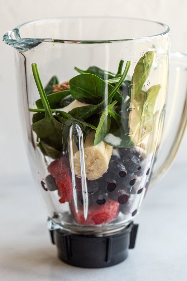 fresh produce in a blender for a smoothie