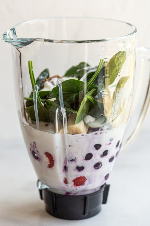 smoothie ingredients with milk kefir in a blender