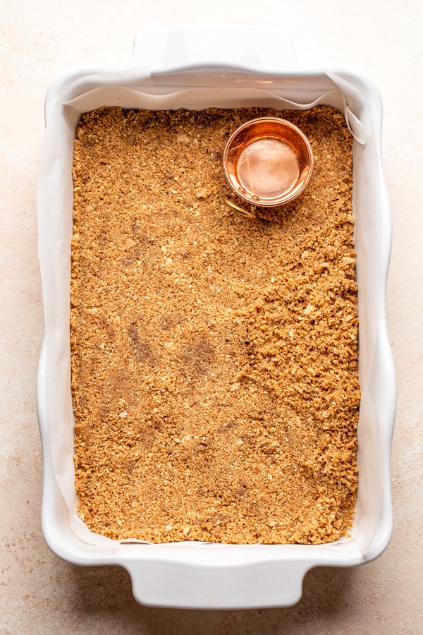 graham cracker crust in a baking dish