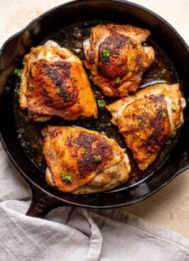 pan roasted chicken thighs in a pan