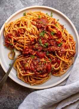 venison bolognese on a blue plate