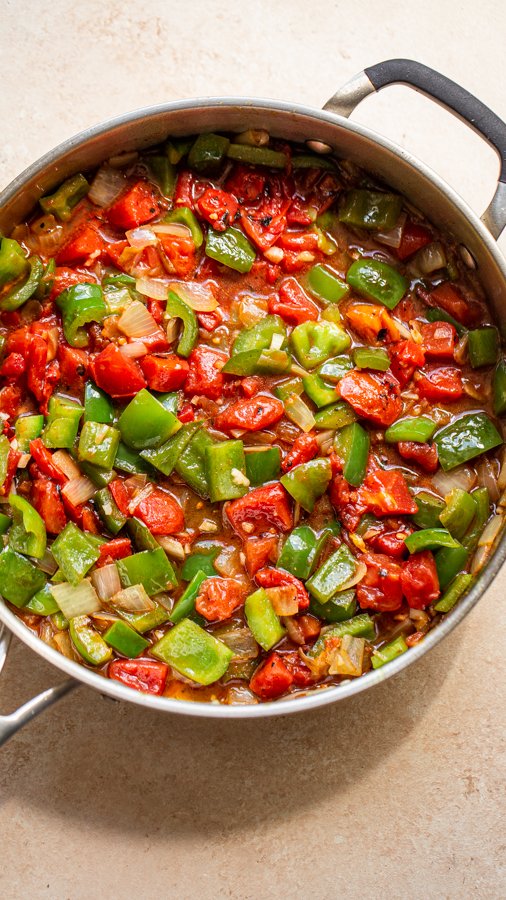 tomatoes and pepper in a large pan
