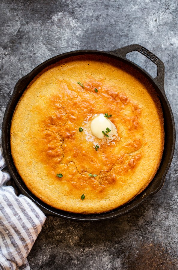 cornbread in a skillet on a grey counter