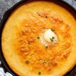 cornbread in a skillet on a grey counter