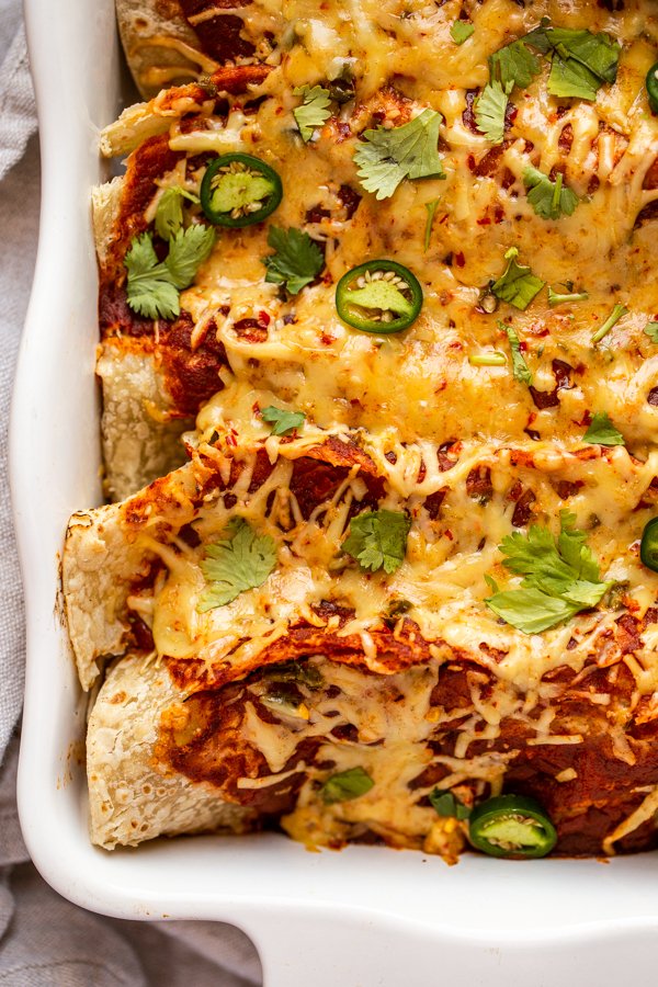 venison enchiladas in a white baking dish