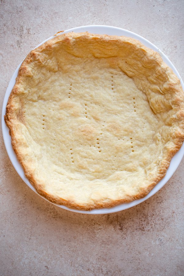 a baked pie shell on a counter