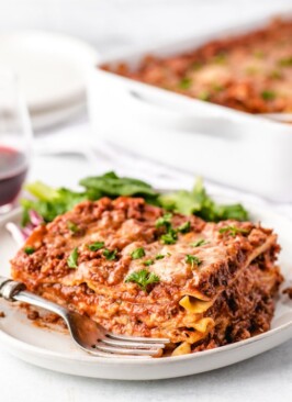 a slice of venison lasagna on a white plate