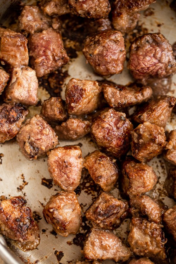 seared venison in a pan