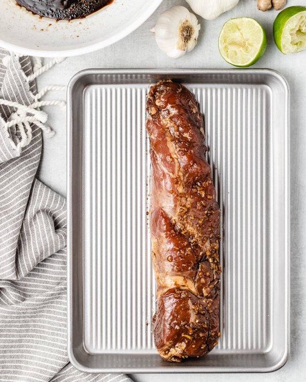 pork tenderloin on a sheet tray