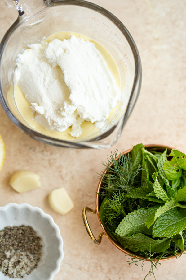 mayo, sour cream, herbs, garlic, salt pepper and lemon