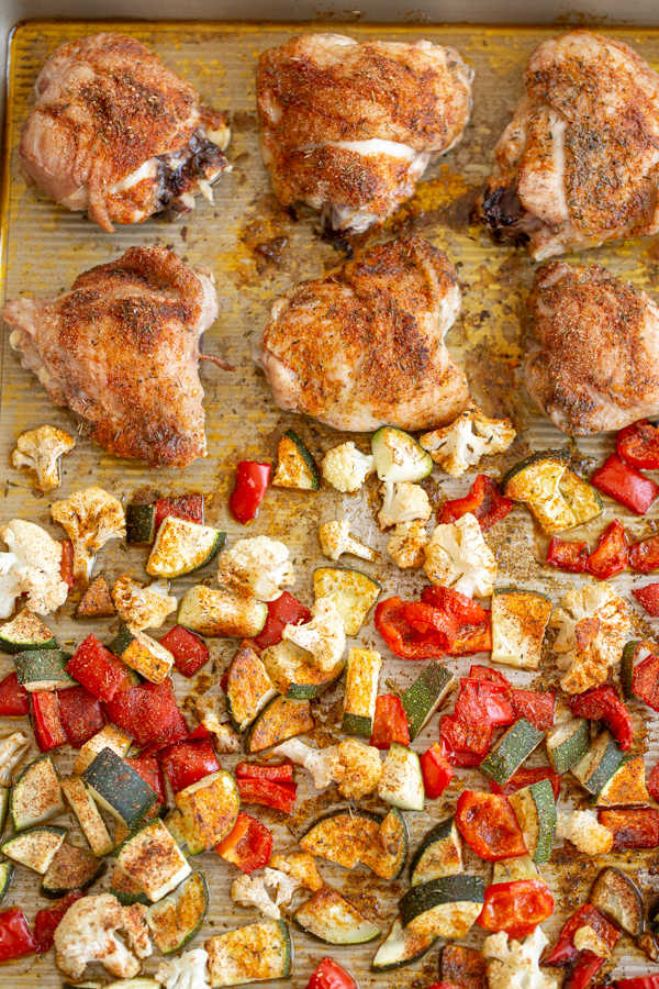 chicken and veggies on a sheet pan