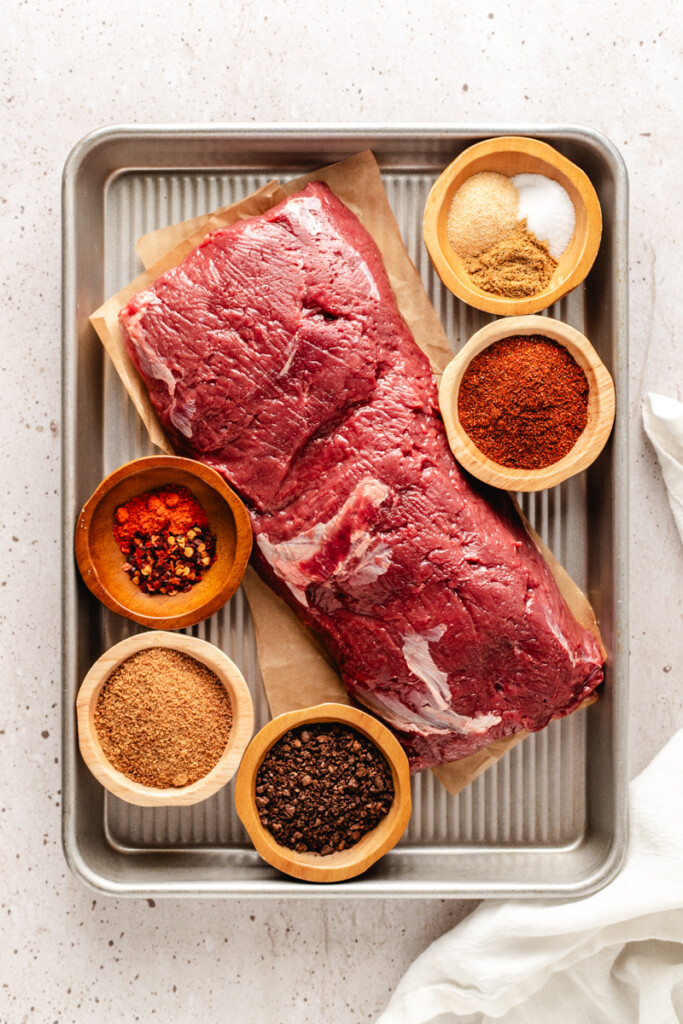 Ingredients to make Smoked Venison Roast on a baking tray