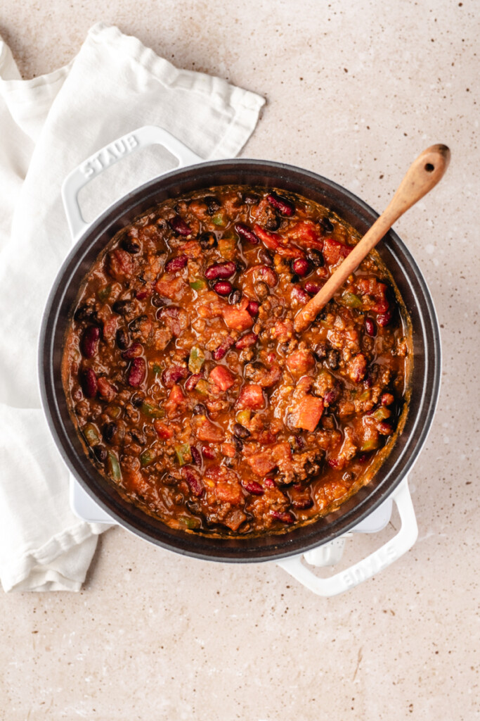 Pumpkin Chili simmering in white soup pot