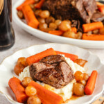 Venison roast served over potatoes