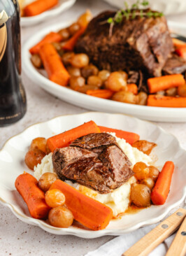 Venison roast served over potatoes
